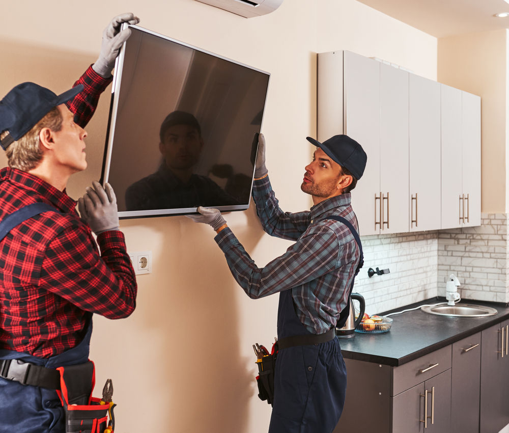 Dismantling electronics equipment two technician remove plasma kitchen